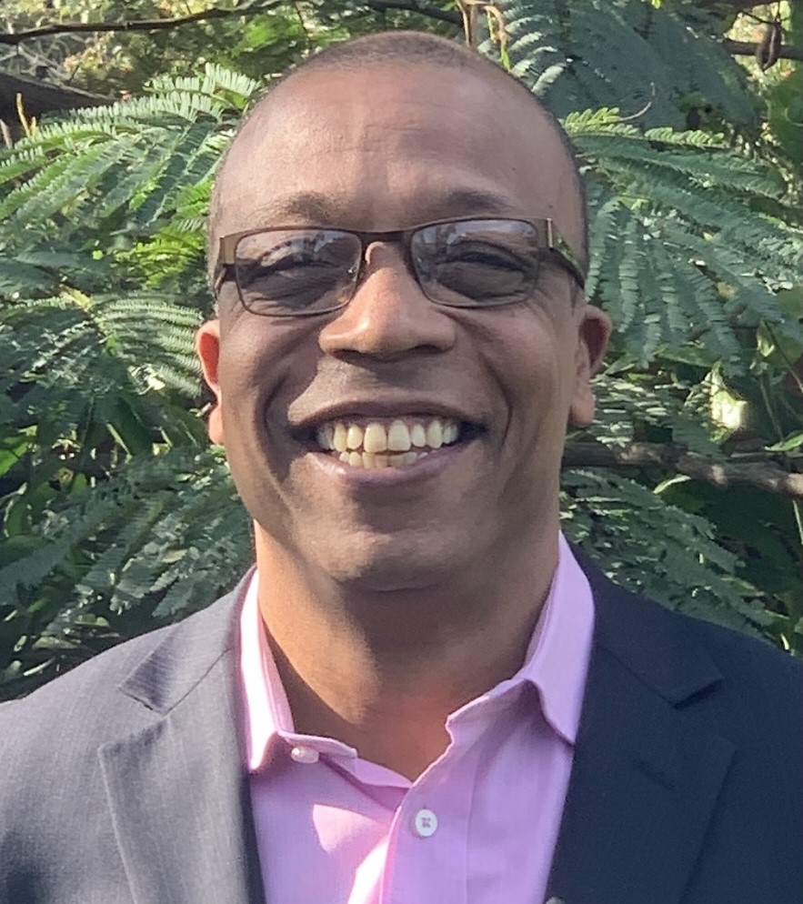 Driss in professional attire - Founder of DT's